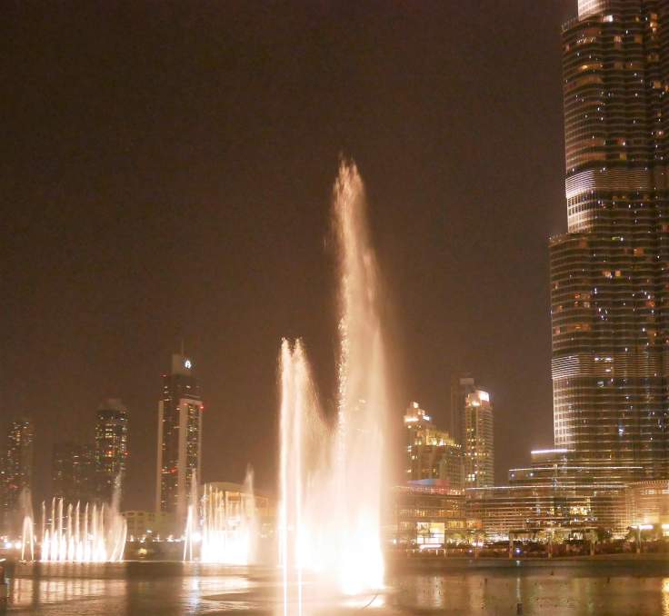 Round the world with my family at a fountain show in Dubai